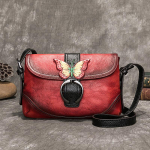 Ehtsast nahast &otilde;lakotid naistele Butterfly Reljeefsed k&auml;ekotid Moodne vintage disain Crossbody Messenger Bag 23*5*15cm punane