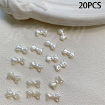20 tk/kott P&auml;rlvalge Retro Prantsuse Lihtne Bowknot Nail Art Aksessuaarid Elegantne &Otilde;rn Bowknot 3D Vaigust isetehtud k&uuml;&uuml;nekunsti aksessuaarid