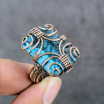 Naturaalsest sinisest topaasist v&auml;&auml;riskivist vasktraadist pakkimine kingituseks ehtes&otilde;rmus suurus 7,5 l1U89