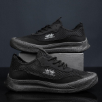 Madalad meeste vabaajajalatsid hingava v&otilde;rkpinnaga ja libisemisvastased meeste spordijalatsid 39 must