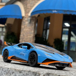 1/24 Lamborghini HURACAN STO Sulamist Sportauto Mudel Diecasts Metallist M&auml;nguasi V&otilde;idus&otilde;iduauto Mudel Simulatsioonheli ja valgusega Kogumine Laste M&auml;nguasi Kingitus sinine