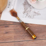 Teleskoopilise pikendatava vardaga k&auml;eshoitavate magnethelmestega seljakraabits ja masseerija kohv