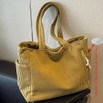 Lihtne velvetist k&auml;ekott lukuga suletava, kerge ja suure mahutavusega, fikseeritud &otilde;larihma ja pol&uuml;estervoodriga, tugev igap&auml;evane reisikott kollane