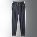 Suvised uued Loose Plus Fat Three Stripes Ice Silk p&uuml;ksid meestele ja naistele &otilde;hukesed elastsed kiirelt kuivavad vabaaja p&uuml;ksid 8XL h&otilde;be