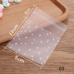 100 tk j&otilde;ulukingitused l&auml;bipaistvad t&auml;pilised kommid k&uuml;psisekotid Pulma s&uuml;nnip&auml;evapeo k&auml;sit&ouml;&ouml; isekleepuv plastikust k&uuml;psispakendite kinkekott 8x10&3cm