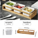 Valge keraamiline kauss bambusest puidust kandik puuviljad maitseained eelroa kandik ja magustoidu serveerimisalus