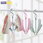 Tavaline tuulekindel kingariiul p&auml;ikesekuivatusrest r&otilde;du kingakuivatusrest Kingade riputuskonks roheline