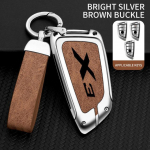 Tsingisulamist autov&otilde;tme &uuml;mbrise katete korpuse pult BMW X3 kaugjuhtimispuldi kaitsme X t&auml;isseeria jaoks BMW auto v&otilde;tmekaane autotarvikute jaoks