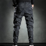 Kamuflaažilised vabaajap&uuml;ksid meestele kevad- ja s&uuml;gishooajal, liibuv korea versioon, elastne v&ouml;&ouml;koht, moodne trend, s&auml;&auml;rised, t&ouml;&ouml;r&otilde;ivaste p&uuml;ksid XXXXXL