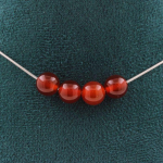 Pierres et Min&eacute;raux. Collier 4 perles Cornaline d'Uruguay qualit&eacute; 5A 8 mm. Chaine en acier Collier femmes, hommes. Taille personnal