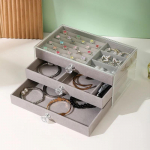 L&auml;bipaistev akr&uuml;&uuml;l ehtekarp 3 sahtli ja sametvoodriga l&auml;bipaistev ehete hoiukarp, k&otilde;rvar&otilde;ngaste, kaelakeede ehete hoiukarp hall