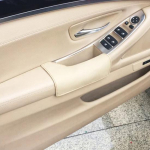 Ehtsast nahast ukse k&auml;etoe kate BMW X5 E70 07-13 jaoks Auto vasakpoolse juhi poolse ukse k&auml;etoe k&auml;epideme paneeli kate ainult vasakpoolse rooliga autodele beež