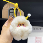 Armas ehtne saarma k&uuml;&uuml;liku karusnaha j&auml;&auml;tis loll auto v&otilde;tmehoidja ripats pompon kotis kott rippuv kingitus beež