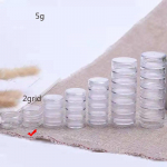 Mitmekihilised plastkarbid Reisikreemide sorteerimiseks Pakkimine L&auml;bipaistvad jaotatud pudelid Kaasaskantav r&otilde;ngaste hoiukarp Mini viimistlusorgan