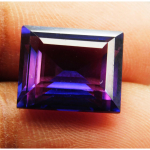 &Auml;&auml;rmiselt haruldane 10,90 ct naturaalne lilla tansiit smaragdl&otilde;ikega SERTIFITSEERITUD lahtine v&auml;&auml;riskivi 12.7 mm approx lilla