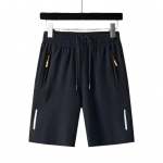 Meeste sportlikud l&uuml;hikesed p&uuml;ksid &uuml;hev&auml;rvilised sirge elastne v&ouml;&ouml;koht vabaaja igap&auml;evane kandmine suures suuruses t&otilde;mblukuga taskud Retro &otilde;hukesed p&otilde;lvede pikkused suvep&uuml;ksid meeste riided 4XL