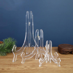 Akr&uuml;&uuml;lplaadi ja fotoraamiga vitriin portselanist, k&auml;sit&ouml;&ouml;st ja Pu'eri teekookidest Small Stand (11cm Height) puhas