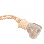 S&uuml;damekujuline auto &otilde;huv&auml;rskendaja parf&uuml;&uuml;m, t&uuml;hi klaaspudel, rippuv kaunistus