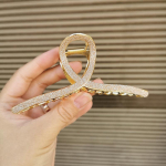 Mati tekstuuriga metallist juukseklamber