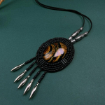 Etnilises stiilis Nepali ehted, nahast kaelakee, eksootiline disain, k&auml;sitsi kootud vintage B&ouml;&ouml;mi esemed