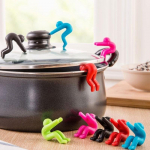 Loomingulised k&ouml;&ouml;gividinad t&otilde;stavad kaane &uuml;levooluseadme stent k&ouml;&ouml;git&ouml;&ouml;riistade jaoks Potikaane &uuml;levool Koduk&ouml;&ouml;gi tarvikud must