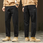 Suured s&uuml;gisstiilis teksad pikad p&uuml;ksid meestele elastsed lahtised vintage k&otilde;rge v&ouml;&ouml;kohaga p&otilde;hilised vabaaja mood must haarem meeste p&uuml;ksid 28 must