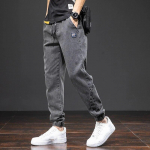 Meeste teksad Slim-fit p&uuml;ksid Vabaaja jooksup&uuml;ksid Streetwear n&ouml;&ouml;riga Harlekiin denimp&uuml;ksid Meeste cargo p&uuml;ksid 6XL must
