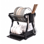 Kahekihiline k&ouml;&ouml;gin&otilde;ude kaussi t&uuml;hjendusrest s&ouml;&ouml;gipulga puuriga majapidamisn&otilde;ude organiseerimisalus