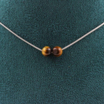 Pierres et Min&eacute;raux. Collier 2 perles Oeil de Tigre 6 mm. Chaine en acier inoxydable Collier femmes, hommes. Taille personnalisable.