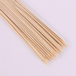 Lastep&auml;eva koomiksikimbu kingitus: Lillekimp bambuskeppide ja nukuga.