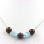 Pierres et Min&eacute;raux. Collier perles Rubis de Mogok, Birmanie, Myanmar 8 mm + Aigue-Marine Chaine en acier inoxydable.