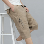 Suvised meeste vabaaja v&auml;lip&uuml;ksid p&otilde;lvp&uuml;ksid, lukuga tasku, puuvillased l&uuml;hikesed p&uuml;ksid, ronimine, elastne v&ouml;&ouml;koht, spordir&otilde;ivad XXL kollane