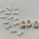 20 tk/kott P&auml;rlvalge Retro Prantsuse Lihtne Bowknot Nail Art Aksessuaarid Elegantne &Otilde;rn Bowknot 3D Vaigust isetehtud k&uuml;&uuml;nekunsti aksessuaarid