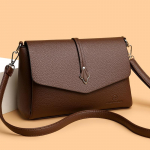 Naiste elegantne pruun kunstnahast &otilde;lakott Praktiline igap&auml;evane crossbody kott Stiilne klapiga &otilde;lakott 27 *11 *18 cm kohv