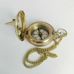 Vintage messingist kompass, nupuvajutusega p&auml;ikesekell, taskuga matkamiseks m&otilde;eldud kompass
