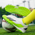 Lastele t&auml;iskasvanutele m&otilde;eldud suured jalgpallijalatsid Madala otsaga naeltega v&auml;listingimustes kasutatavad libisemisvastased professionaalsed treeningsaapad 36 fluorestseeruv kollane v&auml;rv/oranž