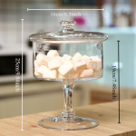 Euroopa stiilis klaaskaanega k&otilde;rge jalaga kommihoidja l&auml;bipaistev vitriinilaud magustoiduhoidja kodu pulmade kaunistus