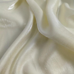 V&auml;rviline klaas, siidist satiinist gradientkangast kleit pulmade s&auml;rava n&auml;oga beebiriided riidest isetehtud merineitsi taustaga riie laudlina