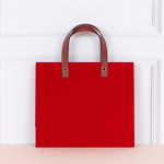 K&auml;sitsi valmistatud sametist ostukott (Punane v&otilde;i Must) punane