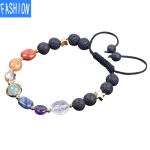 Kosmilise planeedi k&auml;ev&otilde;ru K&auml;sitsi valmistatud vulkaanilisest kivist kootud k&auml;ev&otilde;ru energiakristallidest ehtet&auml;ht Oval Beads