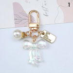 Chic Pearl Bow Bowknot v&otilde;tmehoidja naiste t&uuml;drukute v&otilde;tmehoidja ripatsid auto v&otilde;tmehoidja k&auml;ekoti tarvikud isetehtud ehted kingitused as the picture