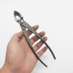 Professionaalne aia oksal&otilde;ikur, puunupuga oksak&auml;&auml;rid