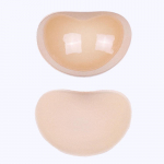 Rindade push-up kleepuv rinnahoidja paksemad k&auml;snast rinnapadjad rindade t&otilde;stmise ja suurendamise jaoks silikoonist eemaldatavad siset&uuml;kid ujumistrikoo jaoks n&auml;htamatu rinnahoidja One size beež