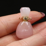 Parf&uuml;&uuml;mipudel looduslikust kivist ripats ovaalne roosa kvarts ehete valmistamiseks DIY kaelakee aksessuaar 16x28mm