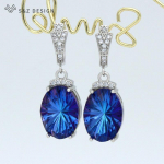 Moodsad luksuslikud suured ovaalsed k&otilde;rvar&otilde;ngad kuupmeetrist tsirkooniumoksiidist k&otilde;rvatropid naistele pulmadeks Elegantsed roosakuldsed ehted