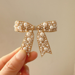Uued Korea Sweet Simulated Pearl Bowknot juuksen&otilde;elad Naistele m&otilde;eldud juuksen&otilde;elad Moodsed juukseaksessuaarid juukseklambrid