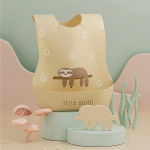 Veekindel reguleeritav toiduvaru Beebi rinnat&uuml;kk koos toidup&uuml;&uuml;djaga &uuml;hekordselt kasutatav laste rinnat&uuml;kk Multifilmi s&uuml;ljer&auml;tik kollane