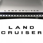 SAWAKAKI Toyota Land Cruiser 250 seeria embleem kleebis esiembleem logo 3D kohandatud v&auml;lisosad (Must) must