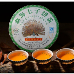 Golden Peacock * 2015 Li Ming Spark Pu-erh teekook 357g Puerh Puer toortee