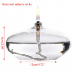 K&auml;sitsi valmistatud l&auml;bipaistvast klaasist k&uuml;&uuml;nlajalgast &otilde;lilamp koos tahiga &otilde;htus&ouml;&ouml;gilaua k&uuml;&uuml;nal, maal&auml;hedane j&otilde;ulude kodukaunistus L